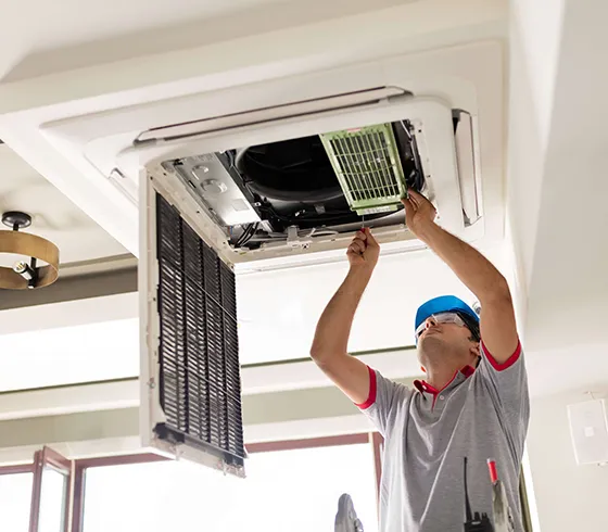 Expert technician performing ductwork repair and replacement services in Rome, GA, helping to maintain efficient HVAC performance and clean airflow.