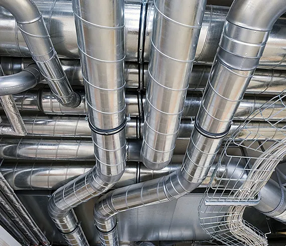 Close-up view of a clean, professionally installed and maintained air duct system for residential air duct services in Summerville, GA.
