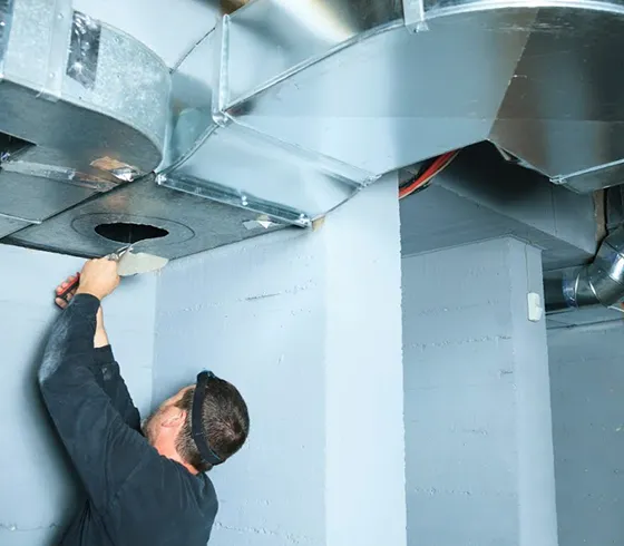 Professional air duct repair services being conducted in Cedartown, GA, ensuring proper airflow and HVAC system efficiency.